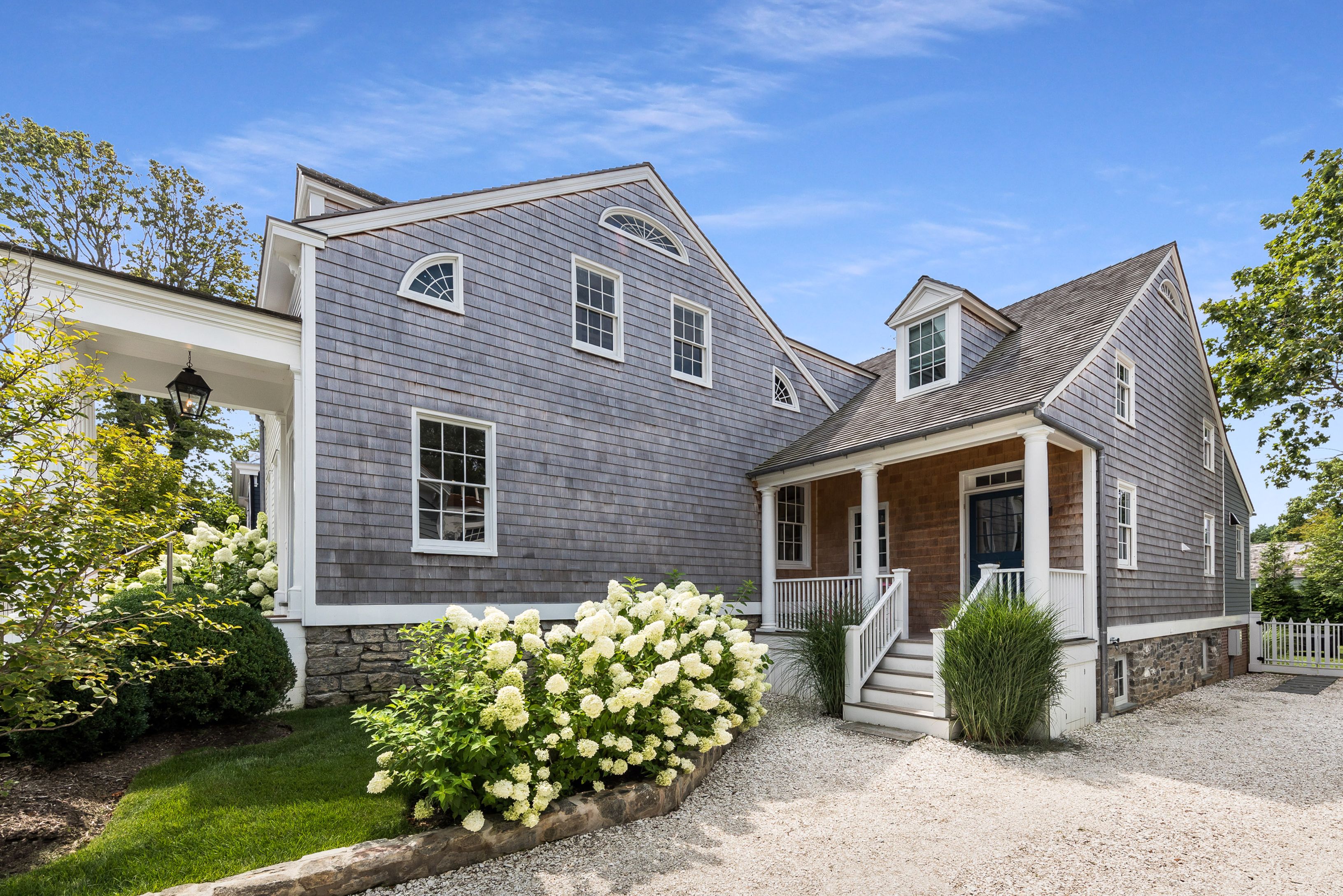 43 Howard Street Sag Harbor, NY 11963 - Photo 6 of 31 a front view of a house with garden