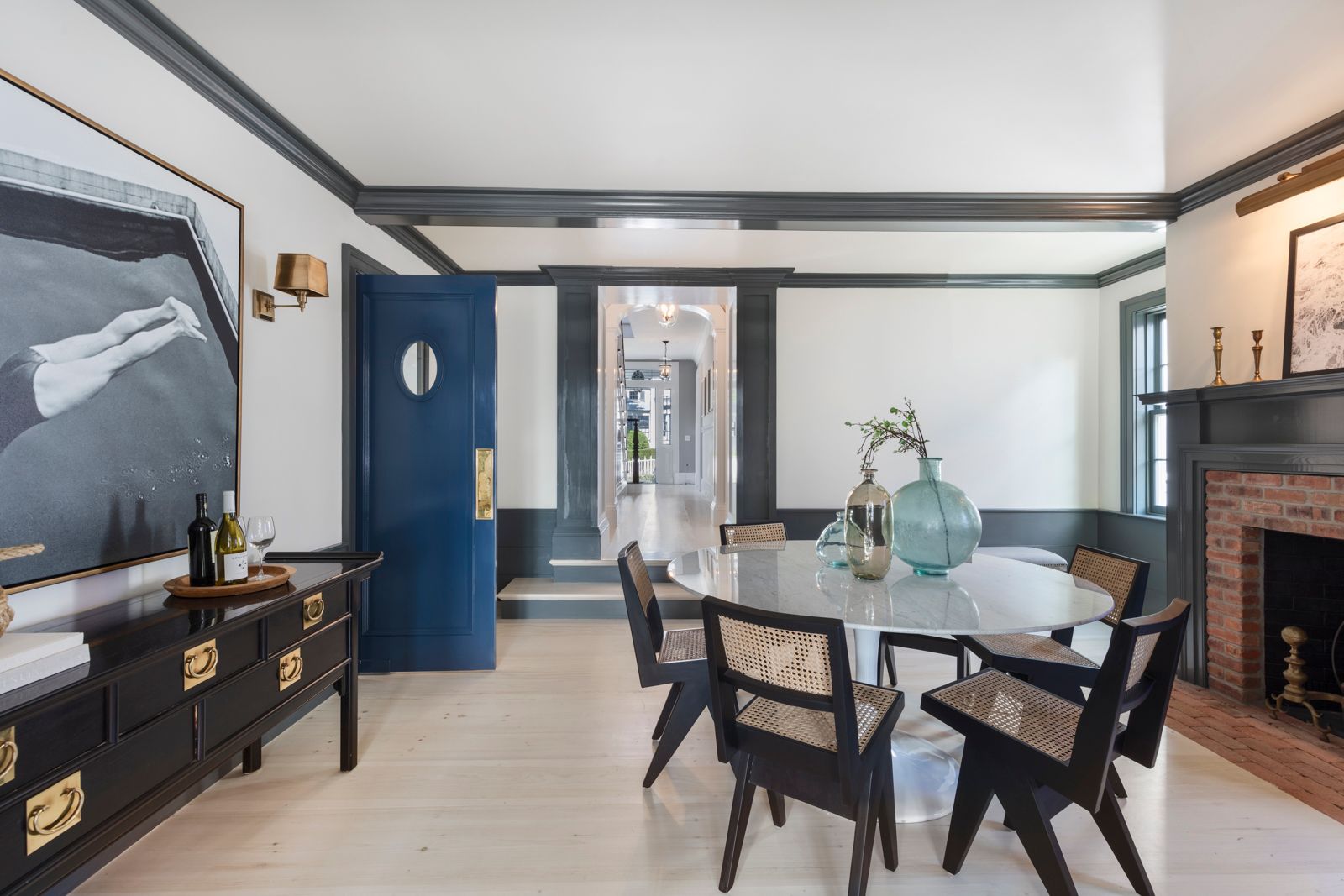 43 Howard Street Sag Harbor, NY 11963 - Photo 9 of 31 a view of a dining room with furniture and chandelier