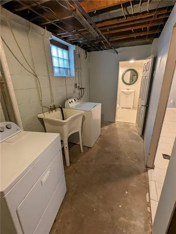 a utility room with dryer and washer