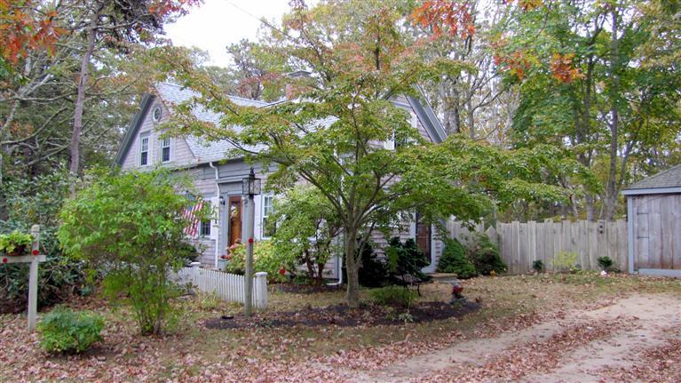 265 Chatham Road Harwich, MA 02645 - Photo 2 of 35 a front view of a house with garden