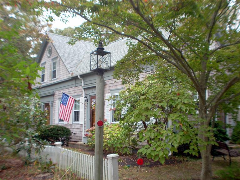 265 Chatham Road Harwich, MA 02645 - Photo 30 of 35 a front view of a house with yard