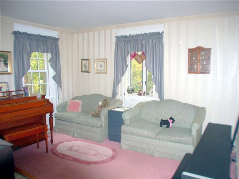 265 Chatham Road Harwich, MA 02645 - Photo 10 of 35 a living room with furniture and a window