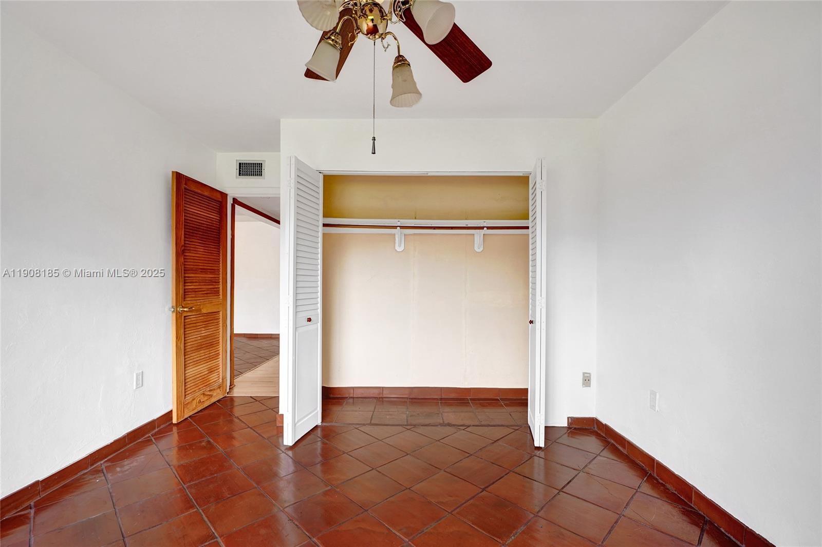 8335 Southwest 72nd Avenue, Unit 205D Miami, FL 33143 - Photo 10 of 19 wooden floor in an empty room