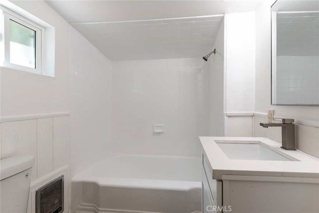 21818 Vista Road Cedarpines Park, CA 92322 - Photo 13 of 41 a bathroom with a sink and a bathtub