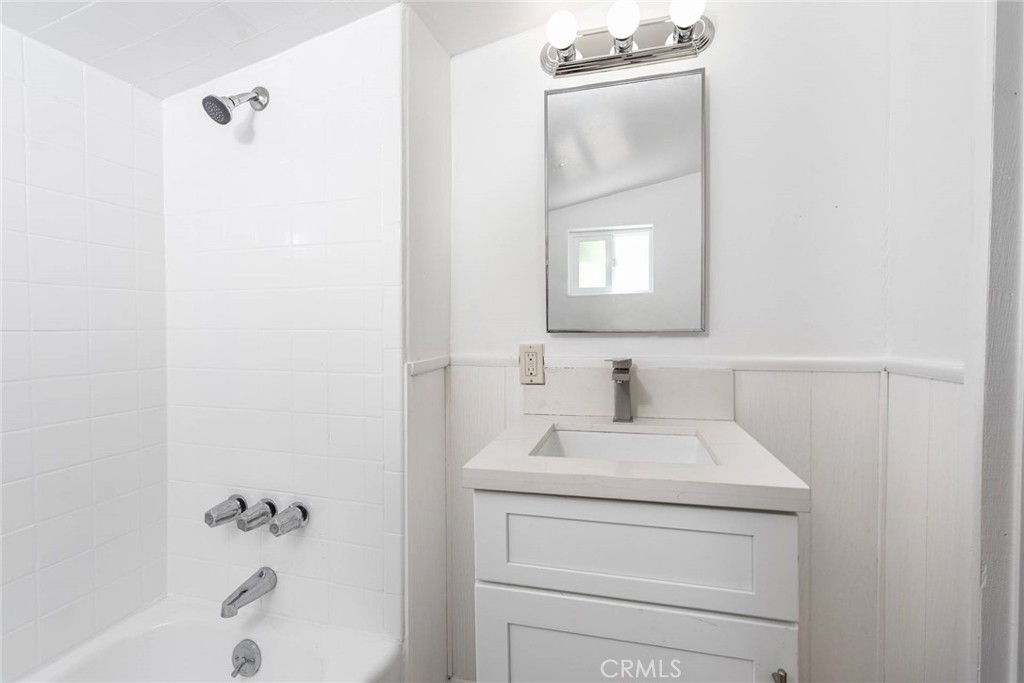 21818 Vista Road Cedarpines Park, CA 92322 - Photo 14 of 41 a bathroom with a sink a toilet and shower