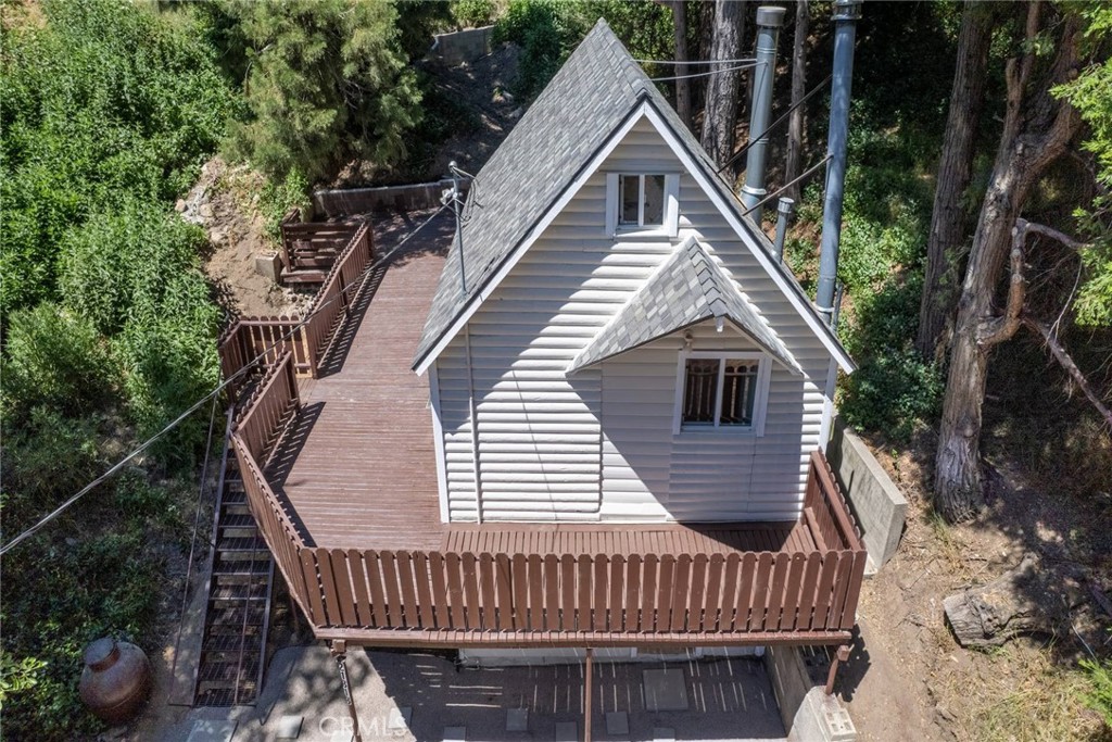 21818 Vista Road Cedarpines Park, CA 92322 - Photo 25 of 41 a view of a house with a deck