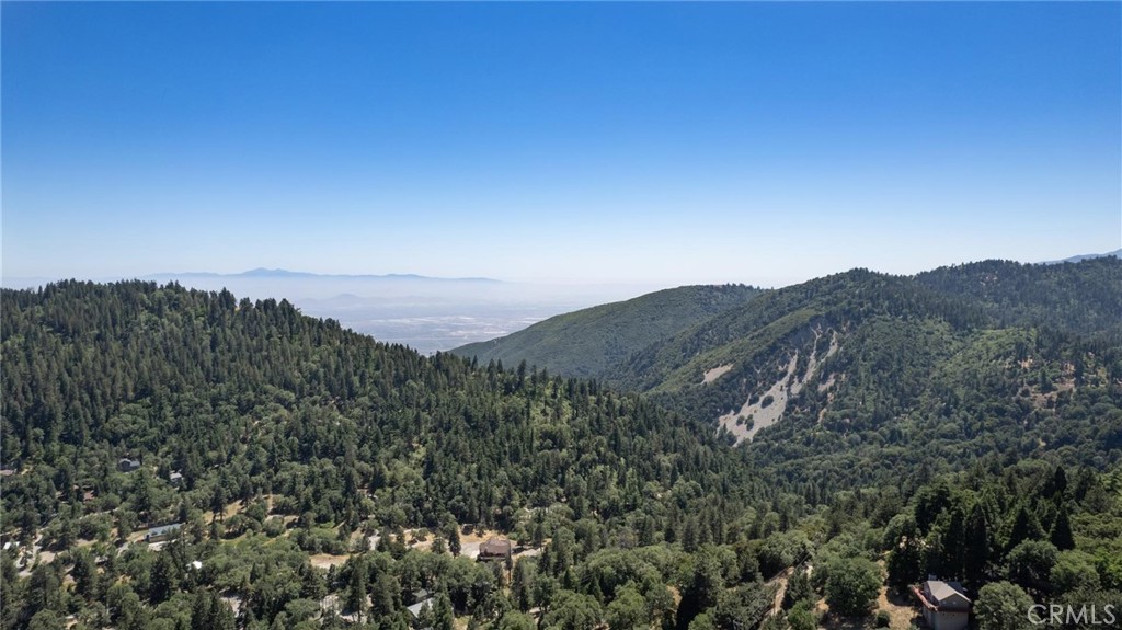 21818 Vista Road Cedarpines Park, CA 92322 - Photo 29 of 41 a view of a large building with a mountain in the background