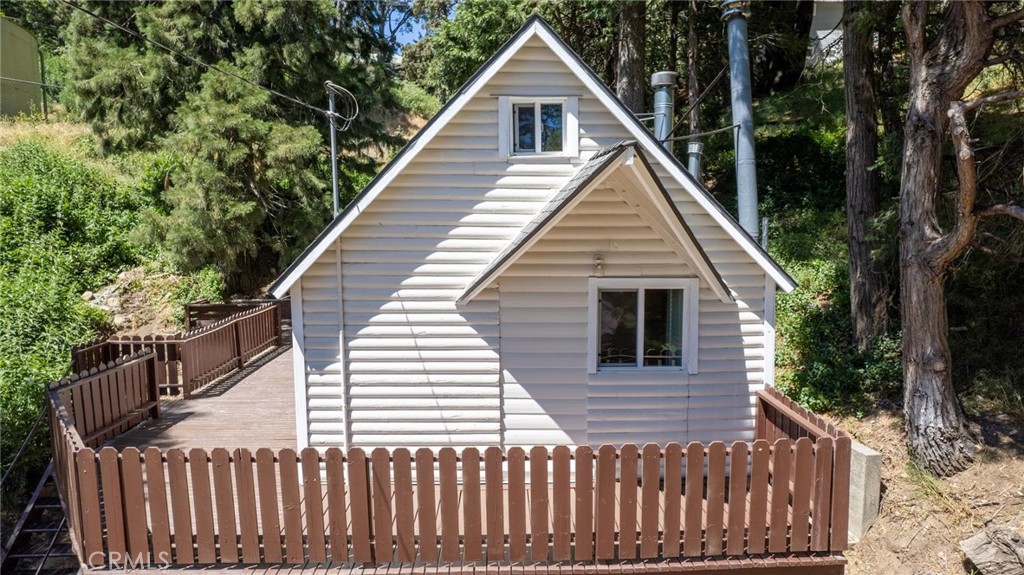 21818 Vista Road Cedarpines Park, CA 92322 - Photo 40 of 41 a view of a house with a yard