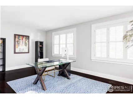 a workspace with furniture and a window