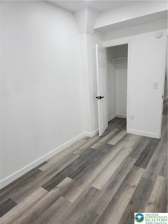 201 Ridge Avenue, Unit 2 Allentown, PA 18102 - Photo 14 of 15 an empty room with wooden floor