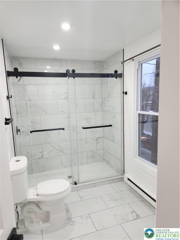 201 Ridge Avenue, Unit 2 Allentown, PA 18102 - Photo 5 of 15 a bathroom with a shower a toilet and a shower