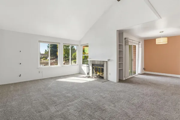 an empty room with windows