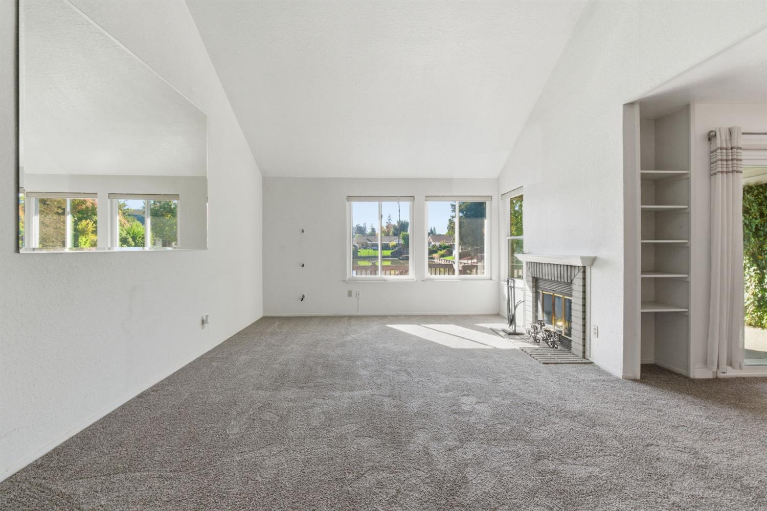 7348 Lighthouse Drive Stockton, CA 95219 - Photo 13 of 56 an empty room with windows