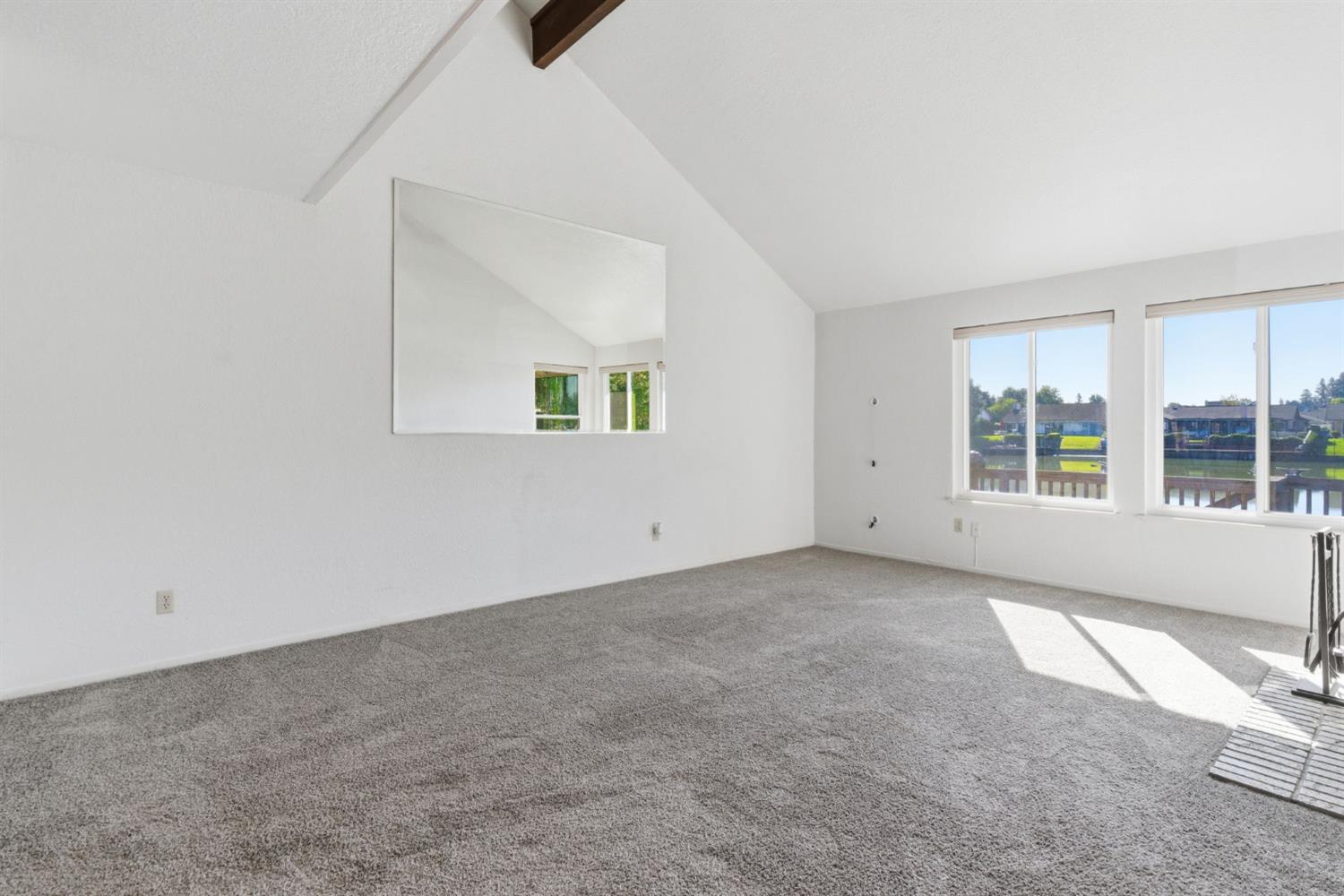 7348 Lighthouse Drive Stockton, CA 95219 - Photo 17 of 56 an empty room with windows