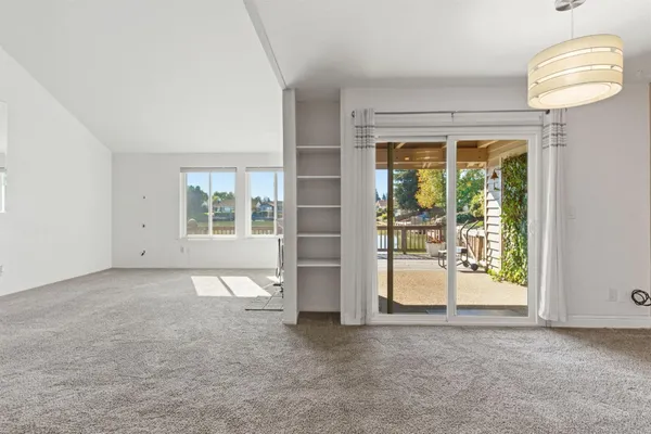 a kitchen with sink cabinets and window