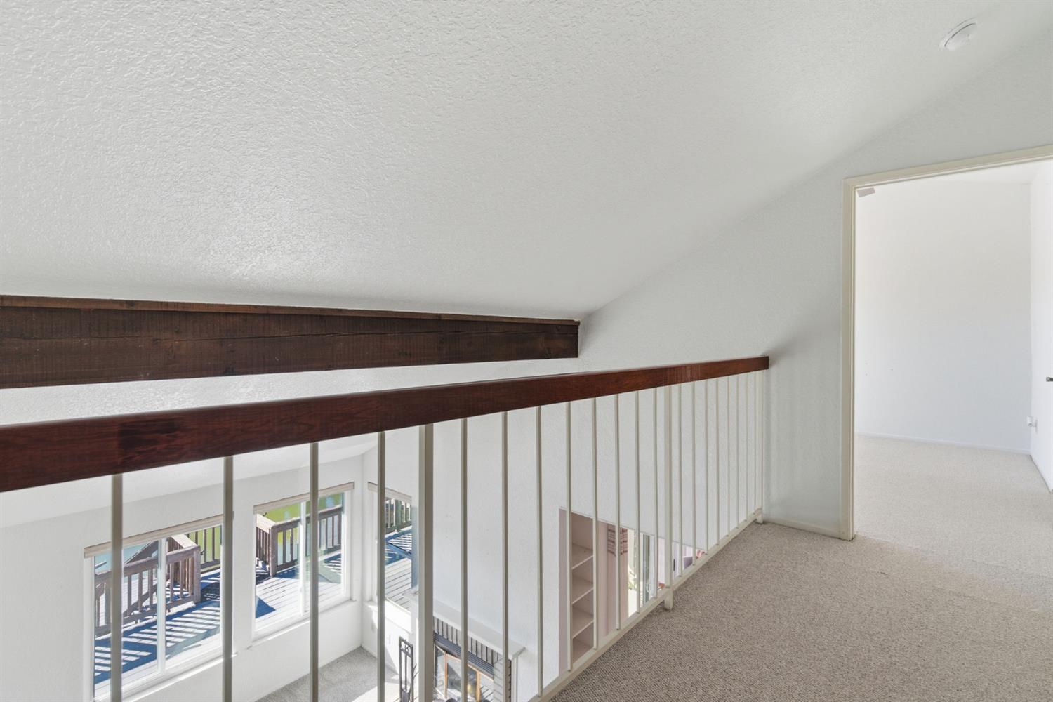 7348 Lighthouse Drive Stockton, CA 95219 - Photo 30 of 56 a view of staircase with rug