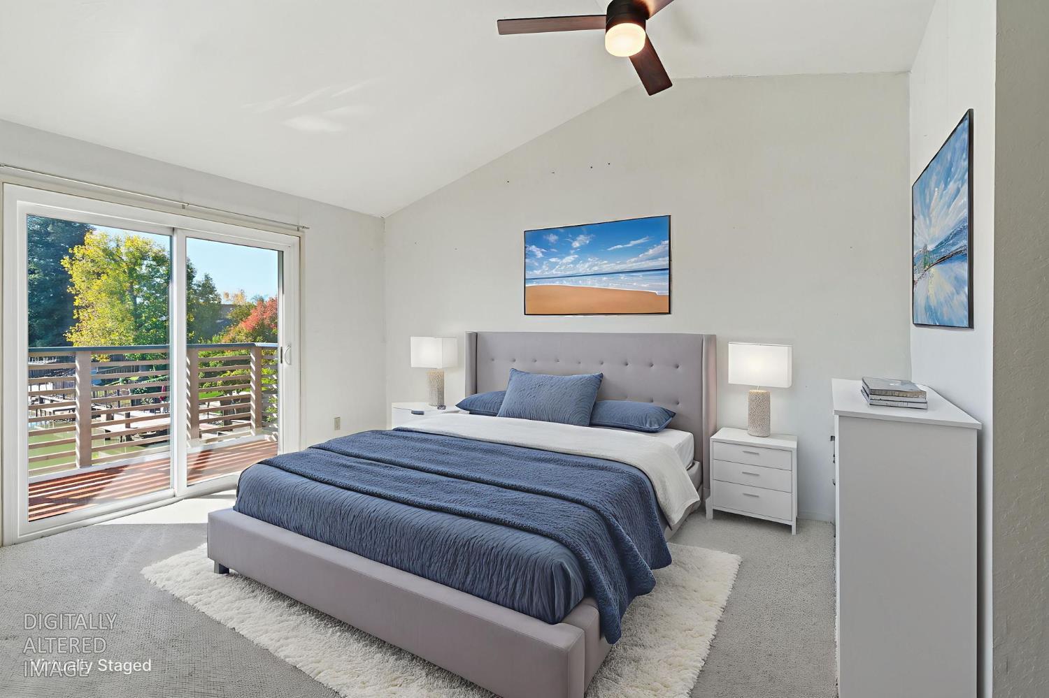 7348 Lighthouse Drive Stockton, CA 95219 - Photo 31 of 56 a spacious bedroom with a bed and glass window