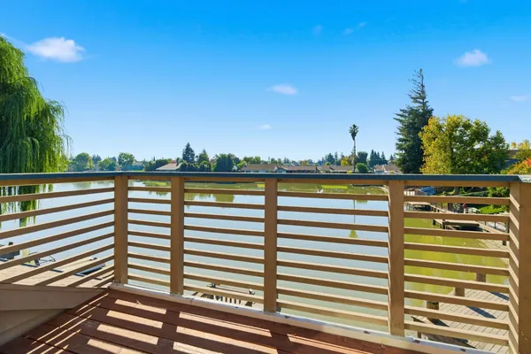a view of balcony with furniture