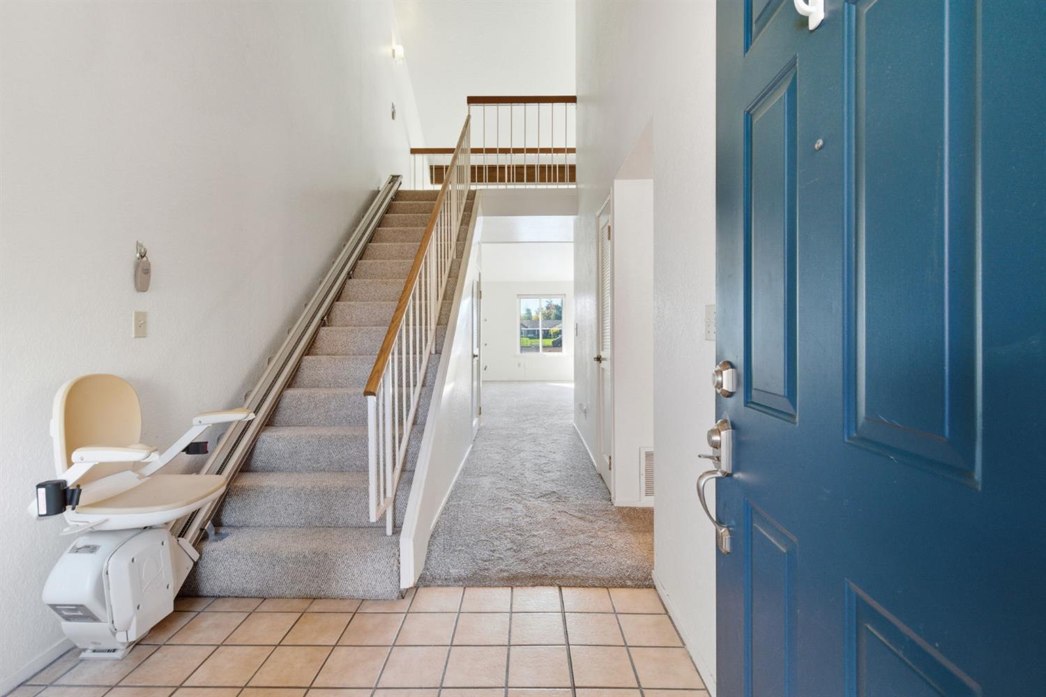 7348 Lighthouse Drive Stockton, CA 95219 - Photo 7 of 56 a view of a hallway with seating area