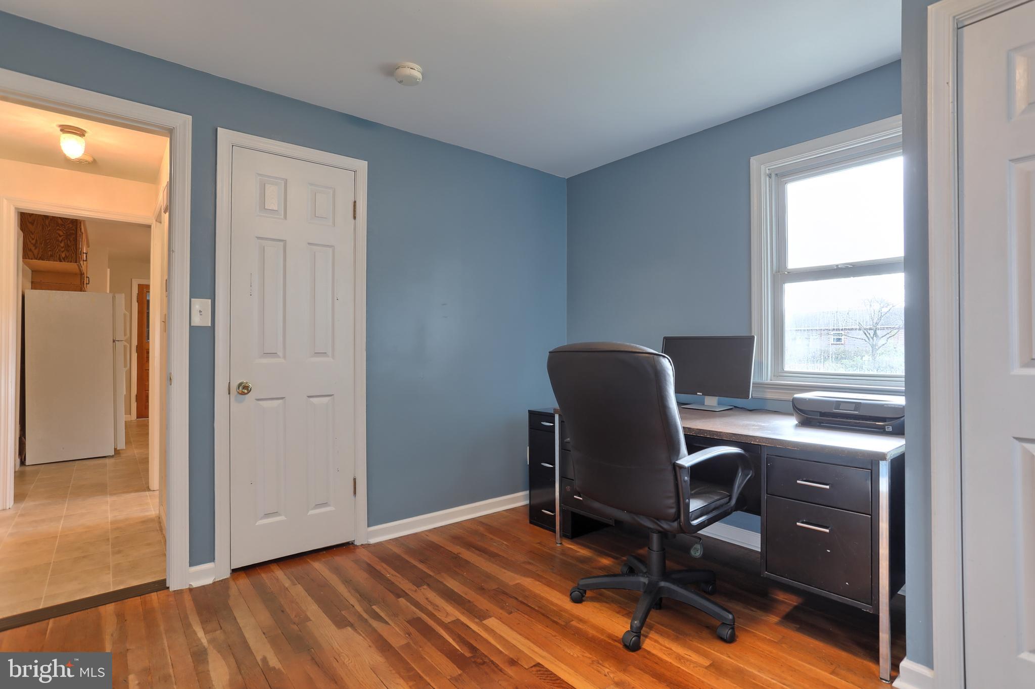 2569 Sheaffer Road Elizabethtown, PA 17022 - Photo 22 of 41 a view of a workspace with furniture and a window