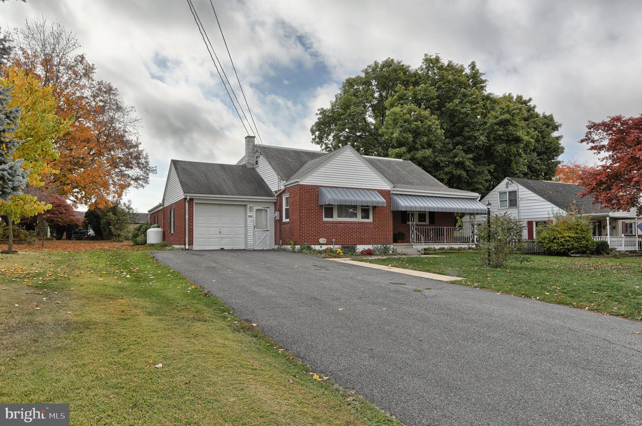 2569 Sheaffer Road Elizabethtown, PA 17022 - Photo 40 of 41 a front view of a house with a garden