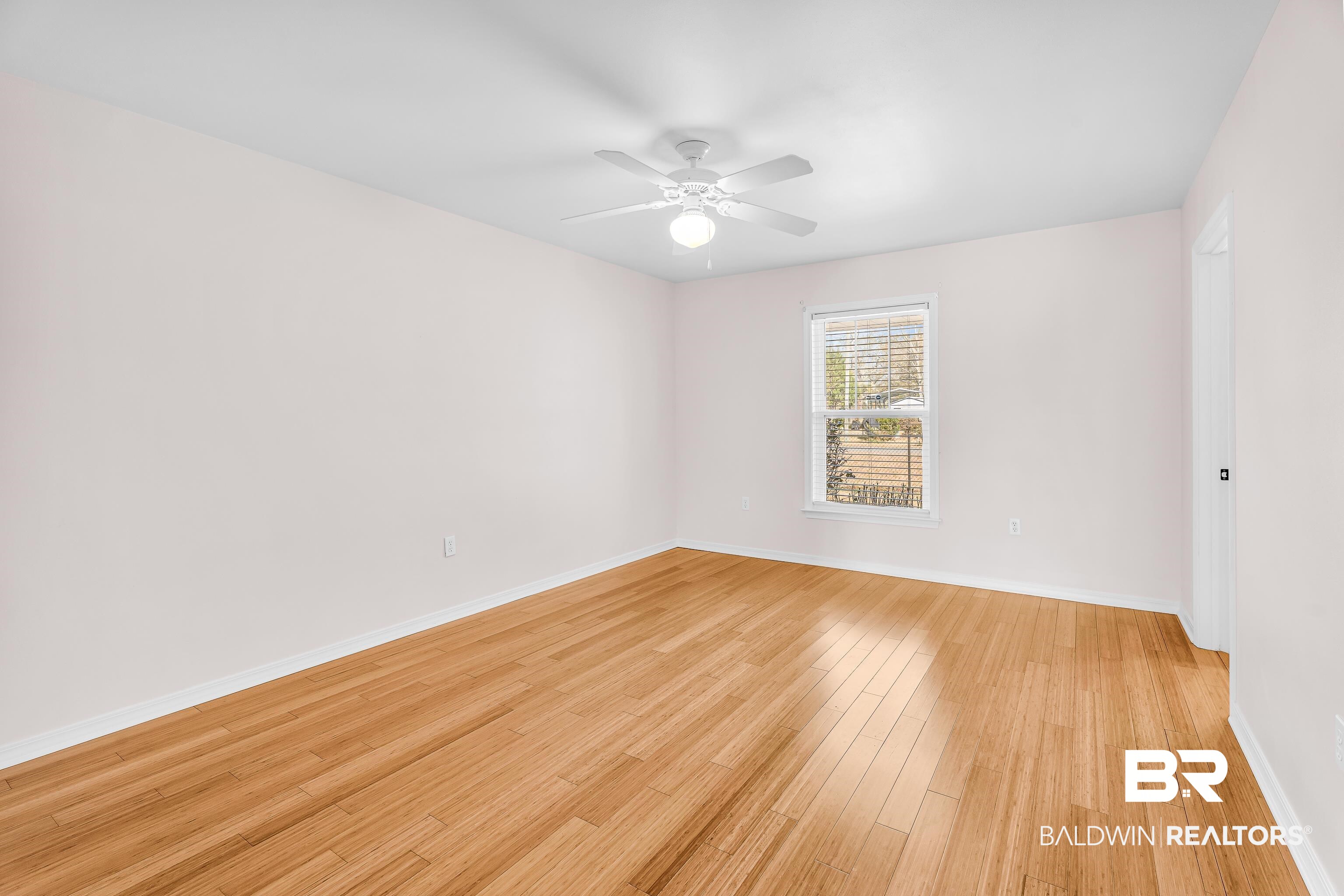 22095 8th Street Silverhill, AL 36576 - Photo 37 of 42 Spare room featuring light wood-style flooring and a ceiling fan