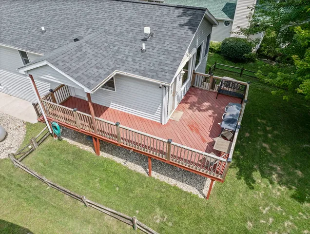 a roof deck with a yard