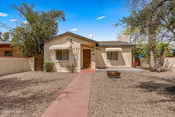 a front view of a house with a patio