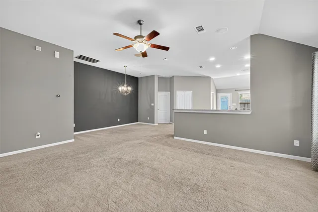 a kitchen with a refrigerator stove and microwave