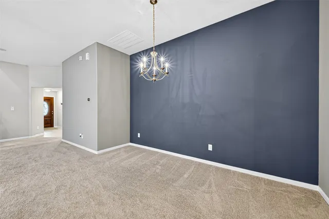a view of storage and utility room with washer and dryer