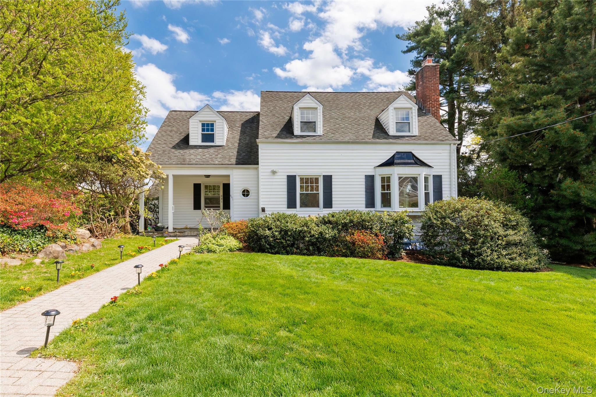Welcome to 201 Clayton Road, in award-winning Edgemont School District.