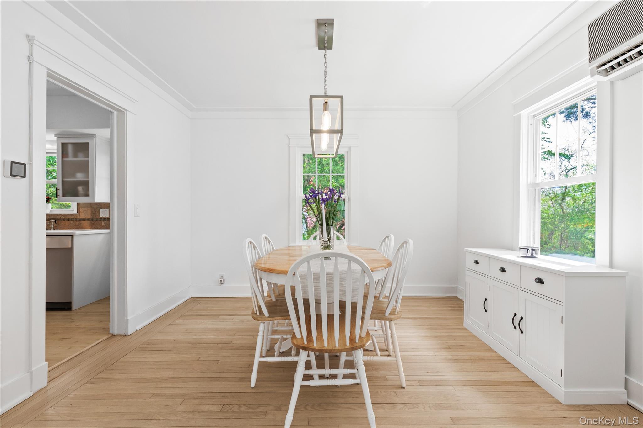 201 Clayton Road Scarsdale, NY 10583 - Photo 11 of 34 Dining Room, with windows offering lovely views of the lush private property.