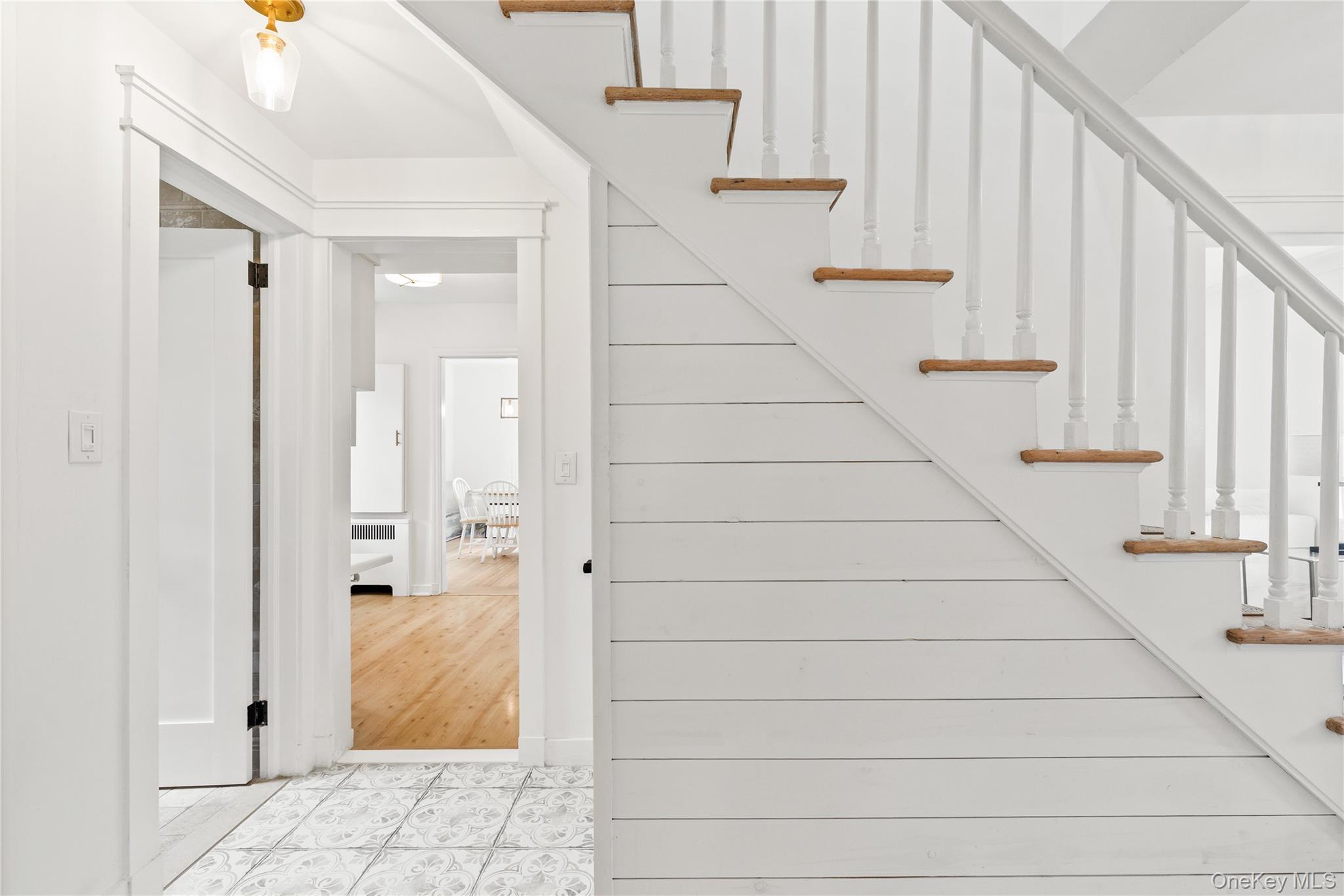 201 Clayton Road Scarsdale, NY 10583 - Photo 16 of 34 Renovated staircase features new shiplap wall accent.