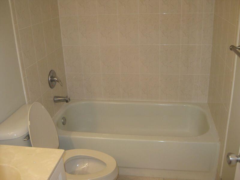 721 North Pine Island Road, Unit 116 Plantation, FL 33324 - Photo 5 of 23 a bathroom with a bathtub and a toilet