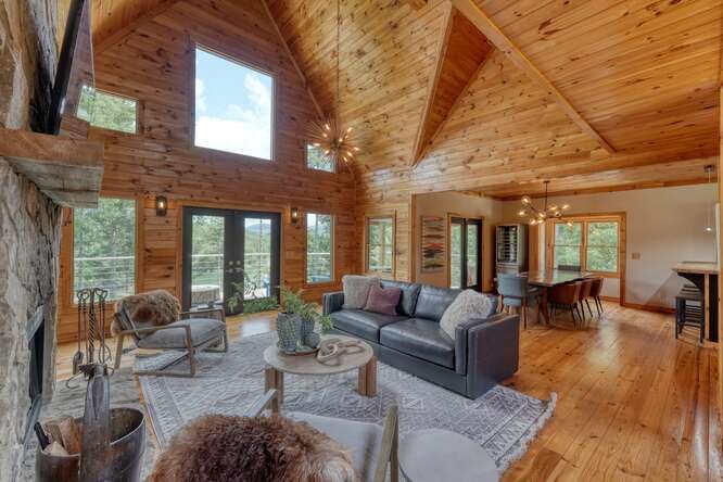 514 Browns Cove Road Blue Ridge, GA 30513 - Photo 13 of 77 a living room with furniture and a large window