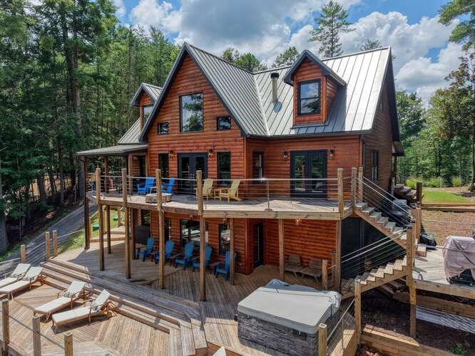 514 Browns Cove Road Blue Ridge, GA 30513 - Photo 63 of 77 an aerial view of a house with swimming pool and sitting area
