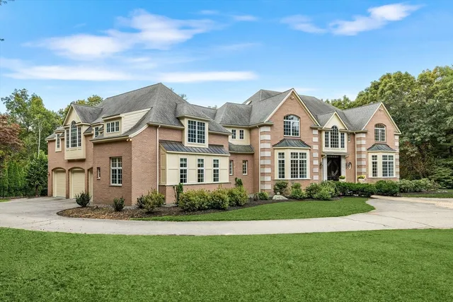 a spacious bathroom with a double vanity sink and a mirror