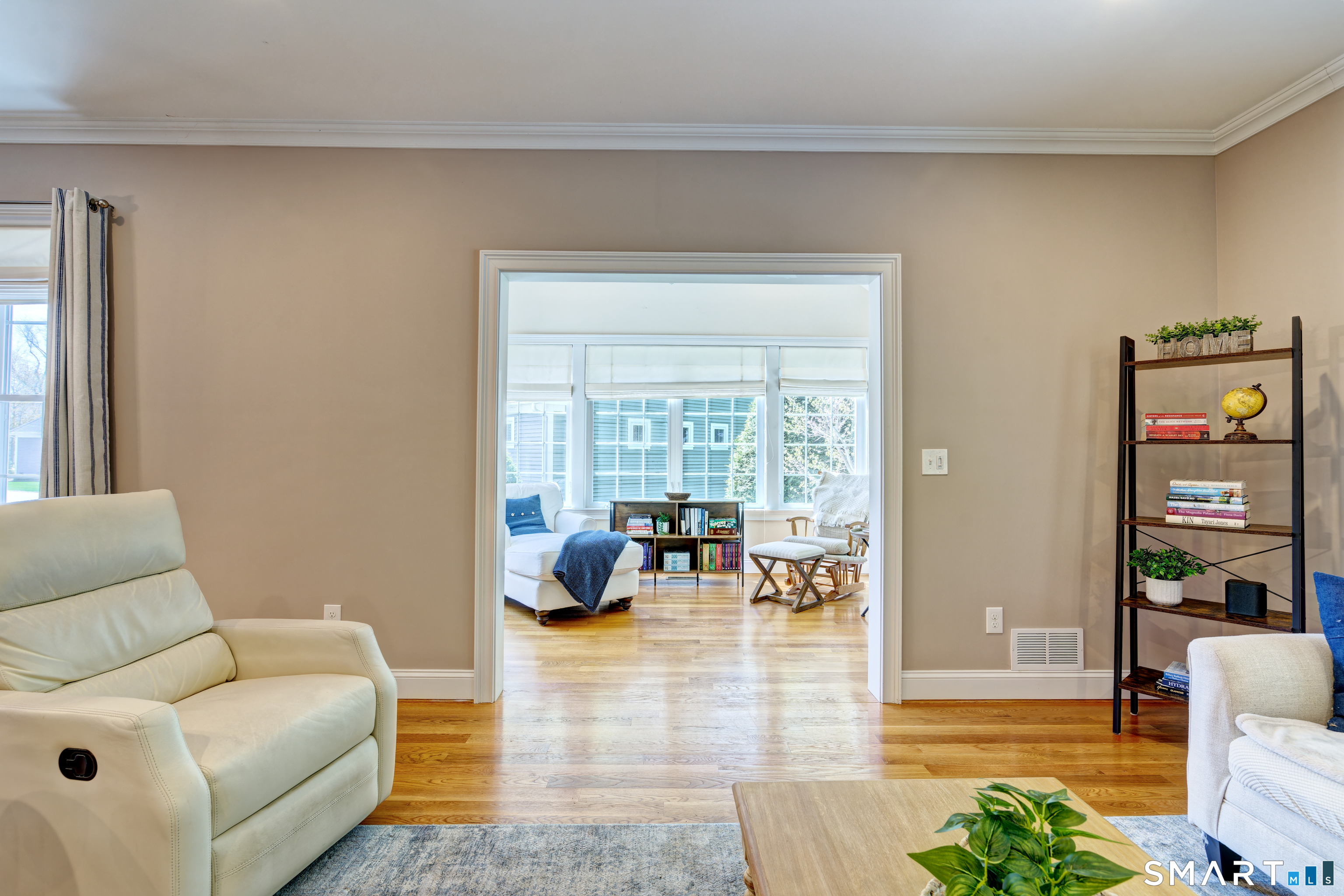 15 Tryon Farm Road Glastonbury, CT 06073 - Photo 10 of 40 Living Room Flowing Seamlessly Into the Four-Season Sunroom