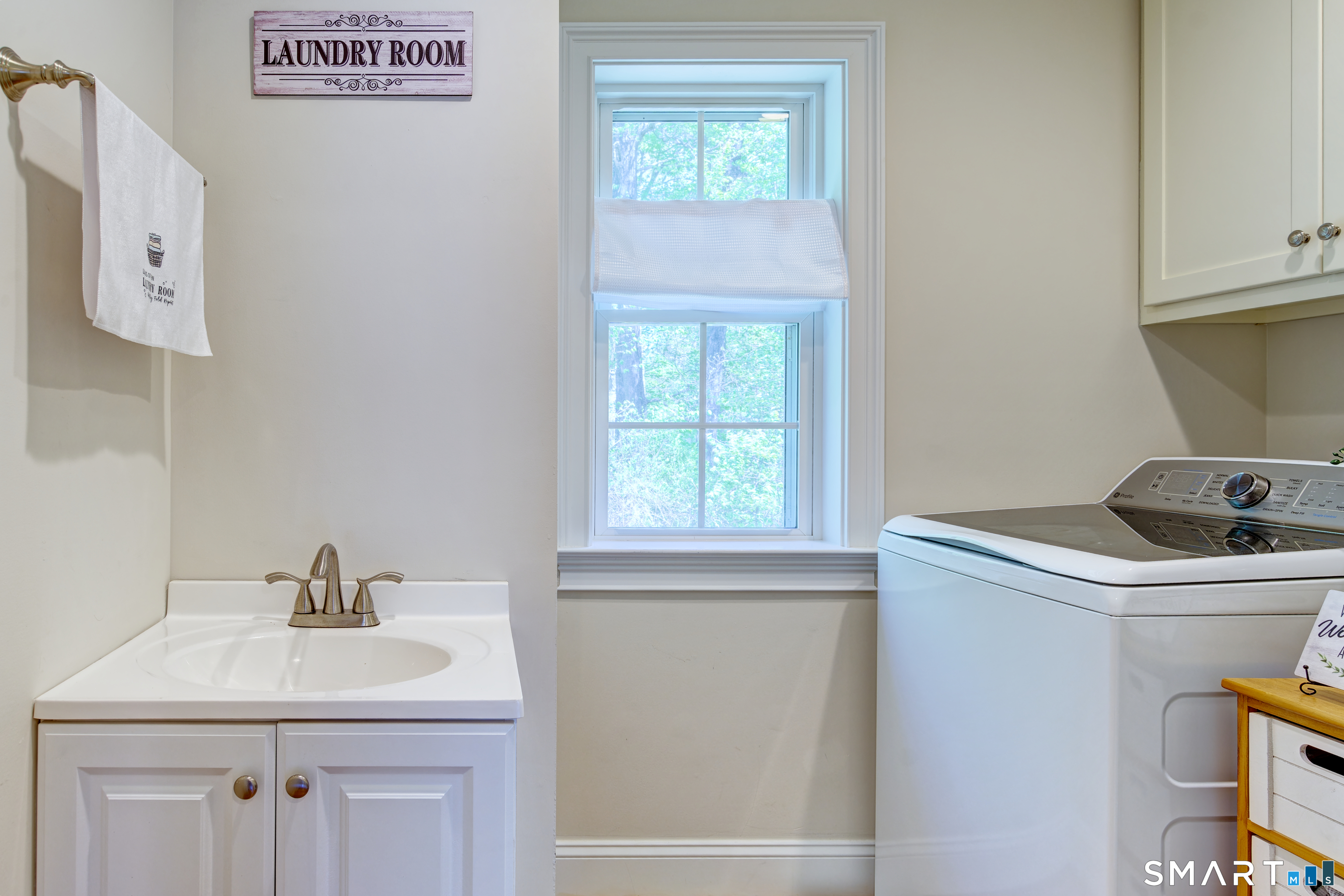 15 Tryon Farm Road Glastonbury, CT 06073 - Photo 35 of 40 Convenient Upper-Level Laundry Room for Everyday Ease