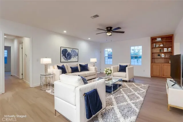 a bedroom with bed and window