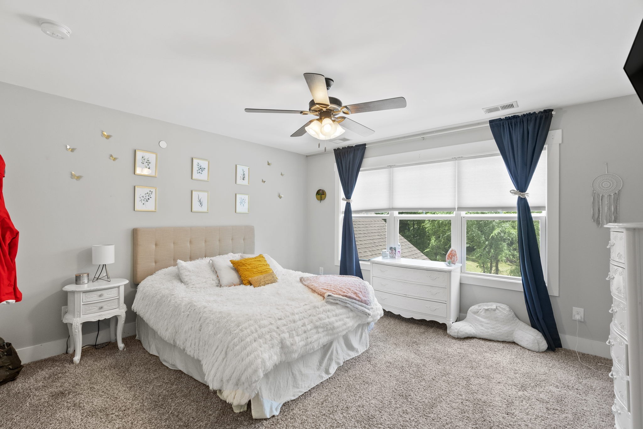 2764 New Hall Road Greenbrier, TN 37073 - Photo 25 of 44 a bedroom with a bed and a chandelier