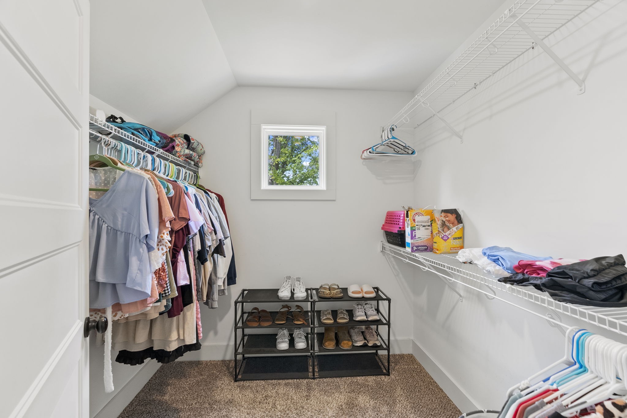 2764 New Hall Road Greenbrier, TN 37073 - Photo 29 of 44 a view of walk in closet with clothes and shoes