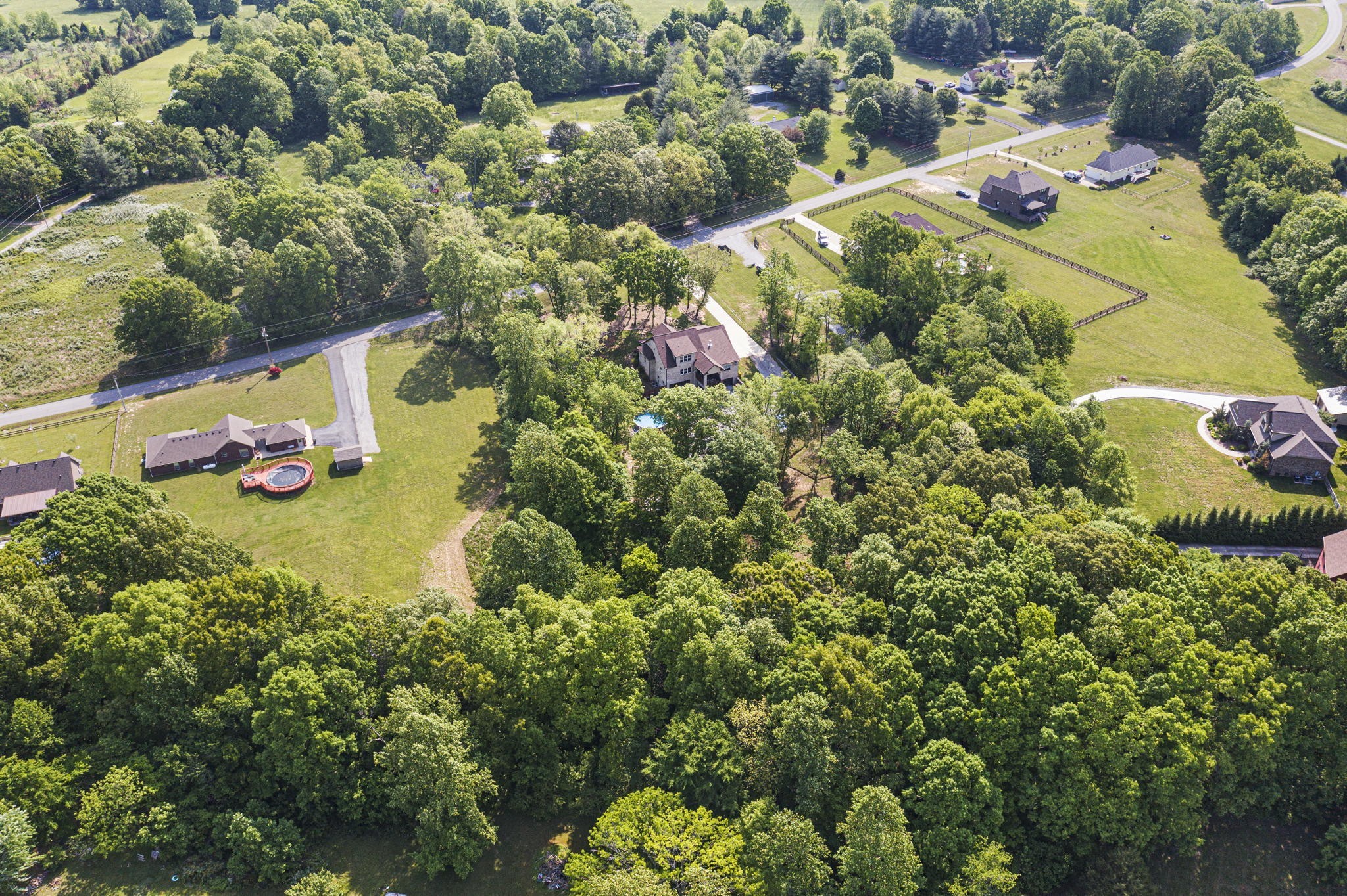 2764 New Hall Road Greenbrier, TN 37073 - Photo 41 of 44 an aerial view of a house with a yard and swimming pool