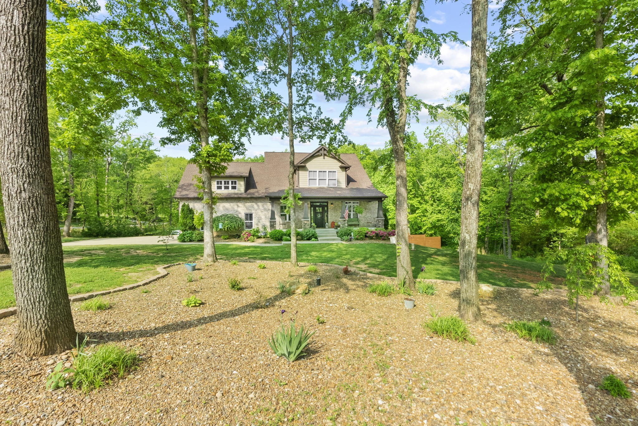 2764 New Hall Road Greenbrier, TN 37073 - Photo 5 of 44 a view of a house with backyard and sitting area