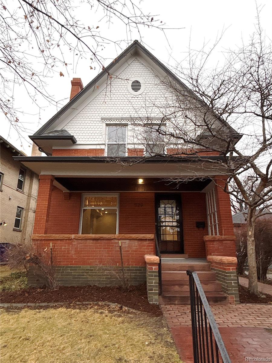 1129 Fillmore Street Denver, CO 80206 - Photo 27 of 32 a front view of a house with balcony