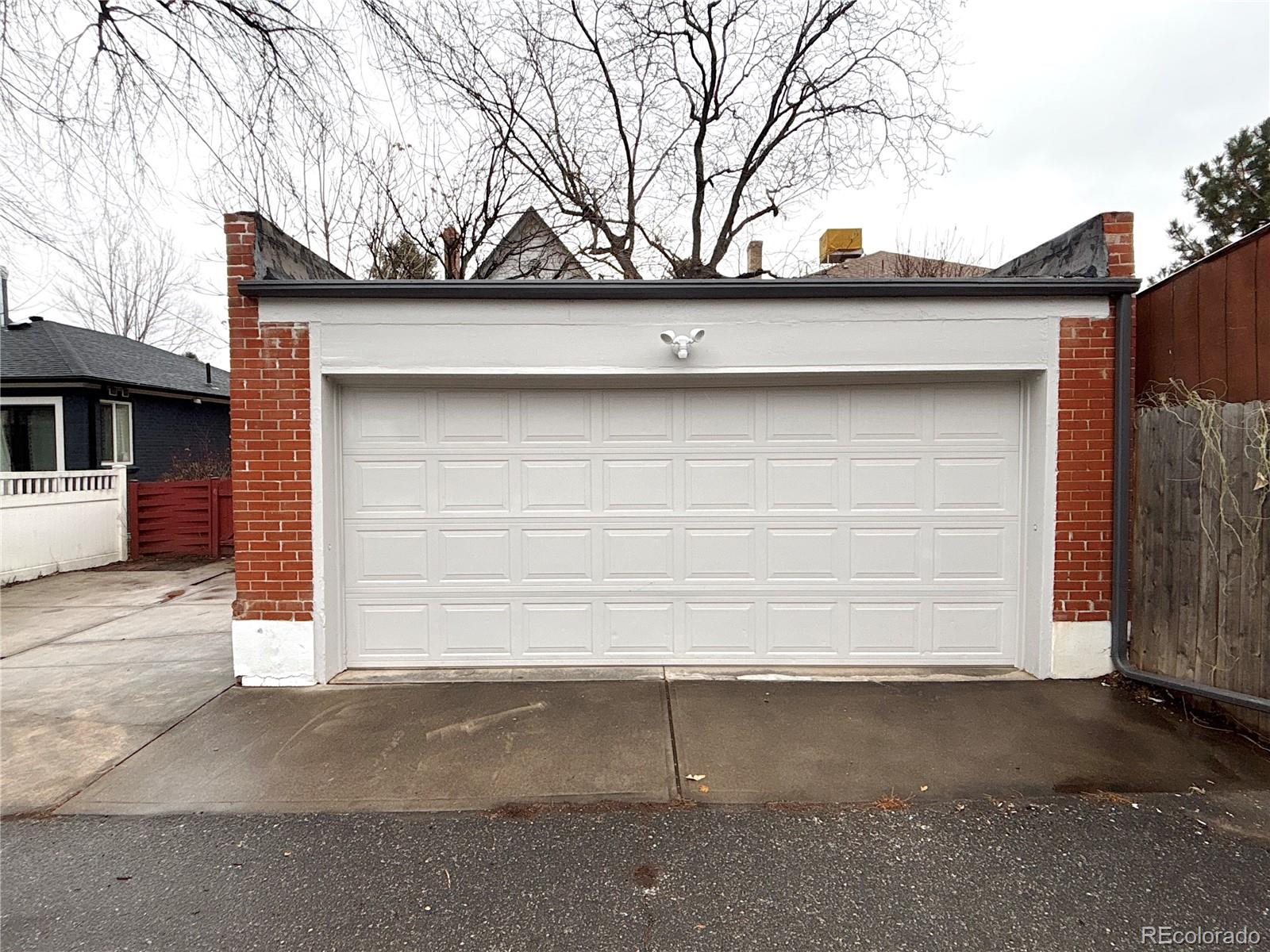 1129 Fillmore Street Denver, CO 80206 - Photo 31 of 32 a side view of a house