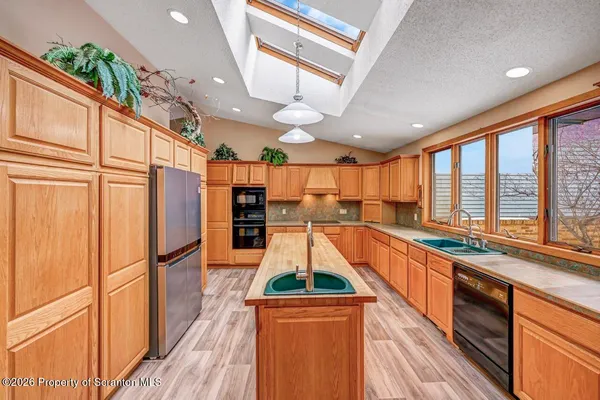 a view of a very nice looking room with a large window