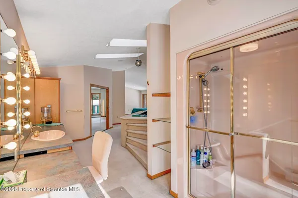 a view of bathroom with a sink and dishwasher