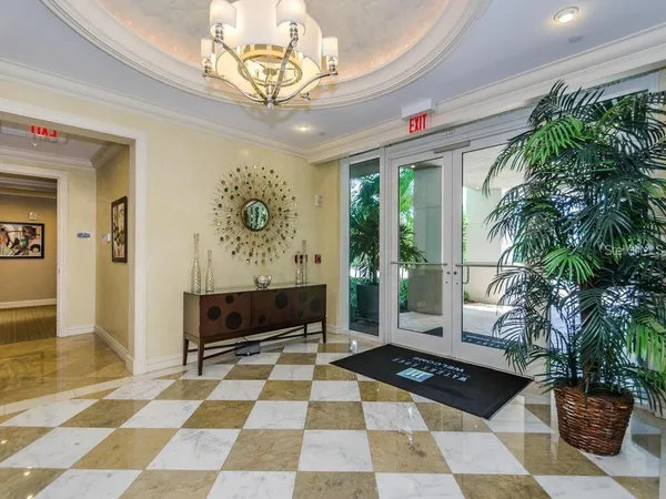 a room with furniture and a rug