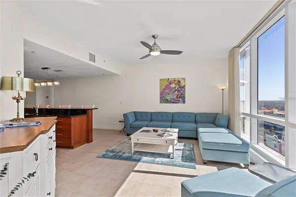 a living room with furniture and a table